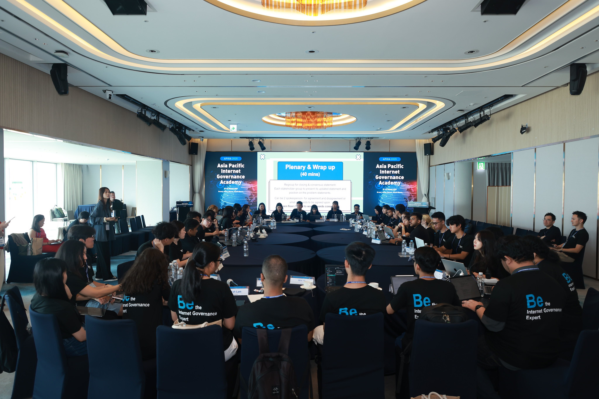 The tables were re-arranged for the Model ICANN Conference. Everyone was seated with their respective delegation and had placards in front of them, so that everyone could see who you were representing.